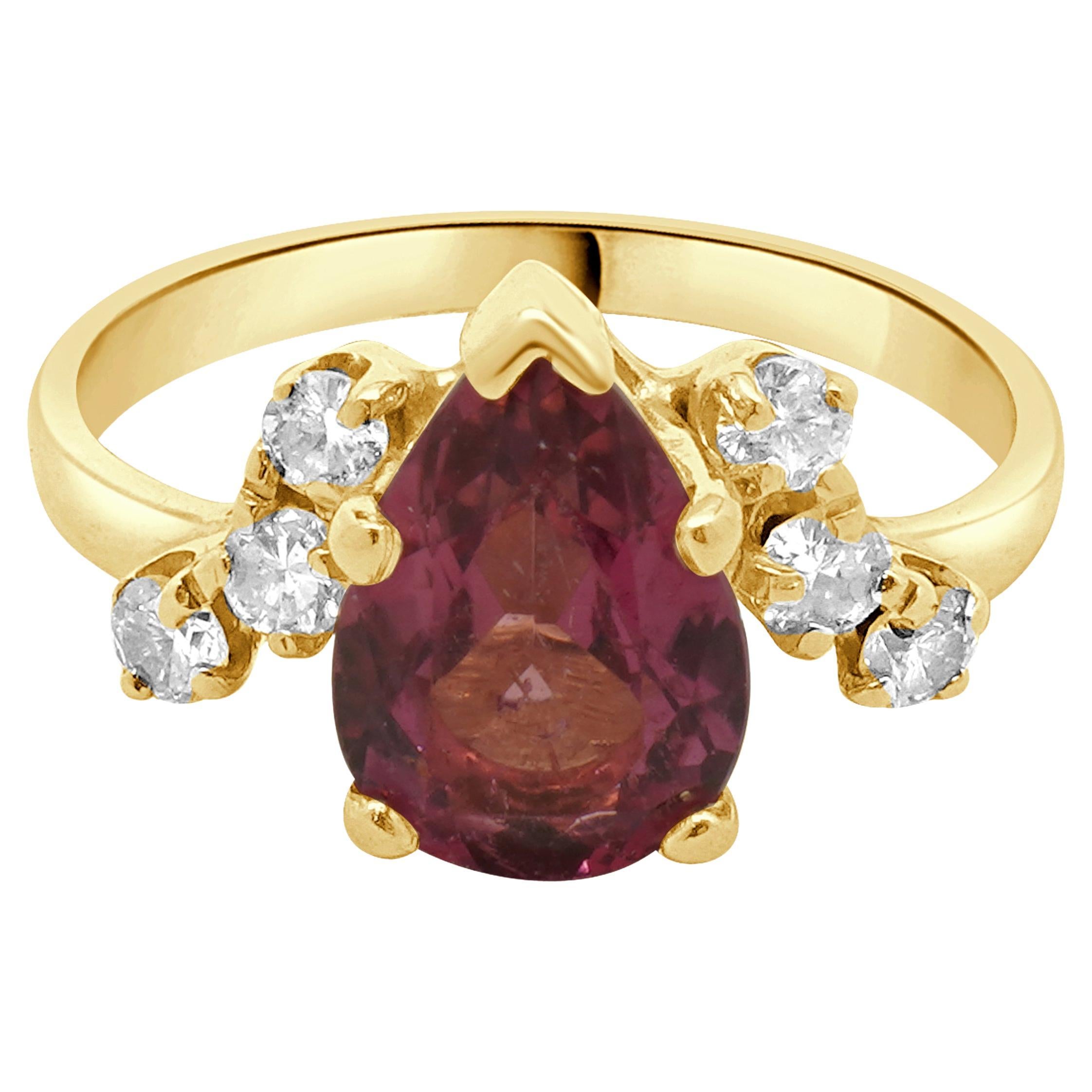 Anello in oro giallo 14 carati con tormalina rosa e diamanti in vendita