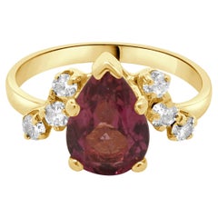 Anello in oro giallo 14 carati con tormalina rosa e diamanti