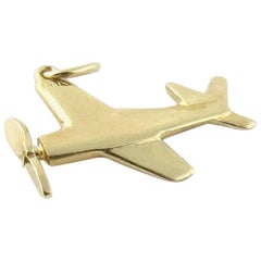 14 Karat Yellow Gold Plane Jet Pendant with Spinning Propeller