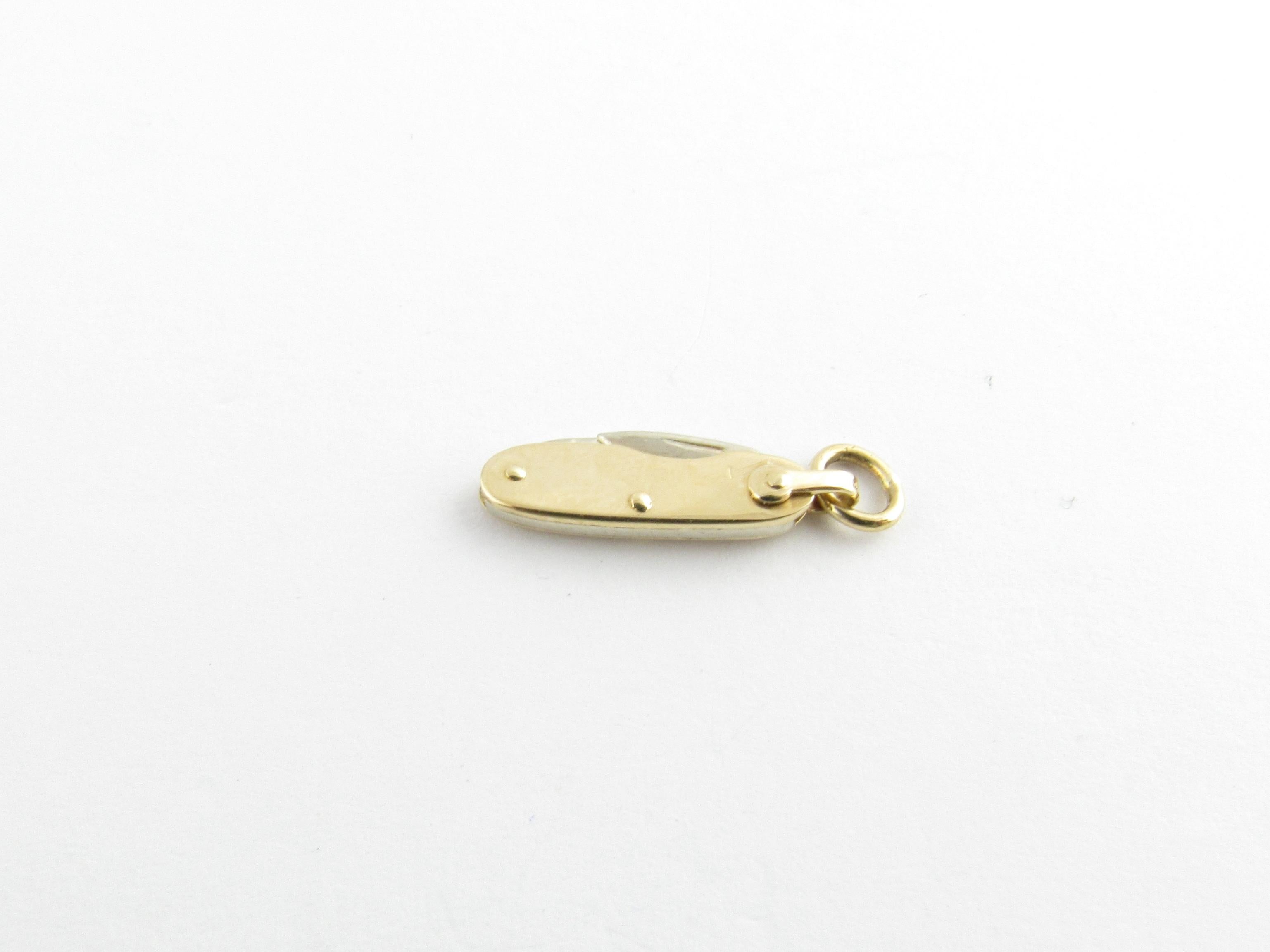 Vintage 14 Karat Yellow Gold Pocket Knife Charm

This unique 3D charm features a miniature hinged pocket knife meticulously detailed in 14K yellow gold.

Size: 17 mm x 5 mm (actual charm)

Weight: 0.7 dwt. / 1.1 gr.

Acid tested for 14K gold.

Very