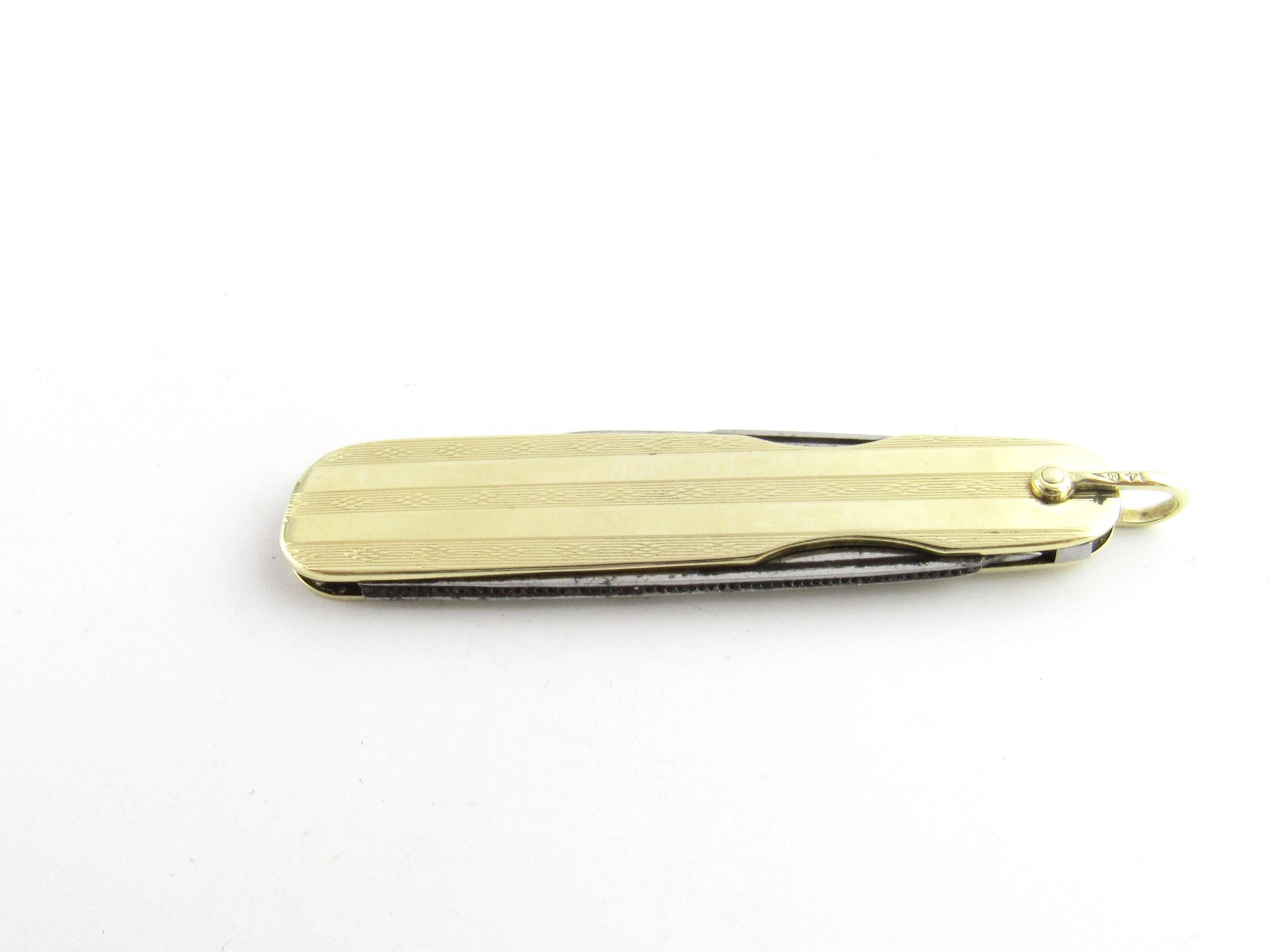 vintage gold pocket knife