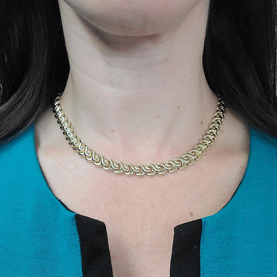 14 Karat Yellow Gold Polished Y Link Collar Necklace Measuring 16 Inches Long. Hidden Clasp With Figure 8 Safety. Finished Weight is 32.3 Grams.