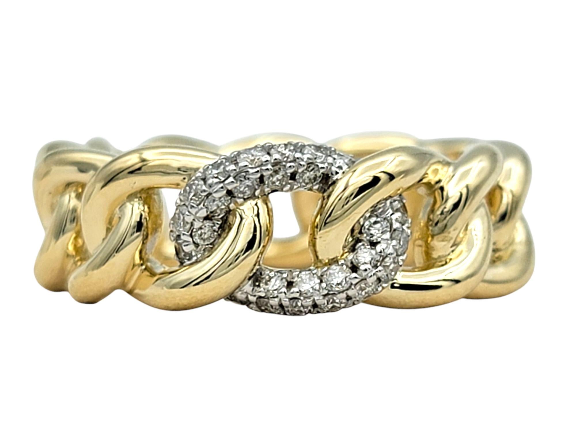 Ring Size: 6

Make a statement with this bold and stylish curb link ring, crafted in 14 karat yellow gold. The chunky chain design is both edgy and elegant, featuring a single central link pavé set with round brilliant cut diamonds for a touch of
