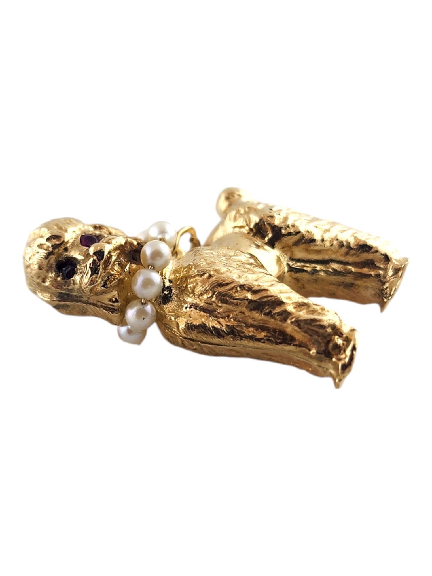 14 Karat Yellow Gold Poodle Charm with Rubies & Pearls

This adorable poodle charm was meticulously crafted from 14K yellow gold with beautiful detailing and is decorated with a collar made up of 9 pearls and 2 red rubies as eyes!

Pearls: 3mm