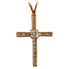 14 Karat Yellow Gold Princess .95ct Diamond Channel Cross 1-1/2”Length