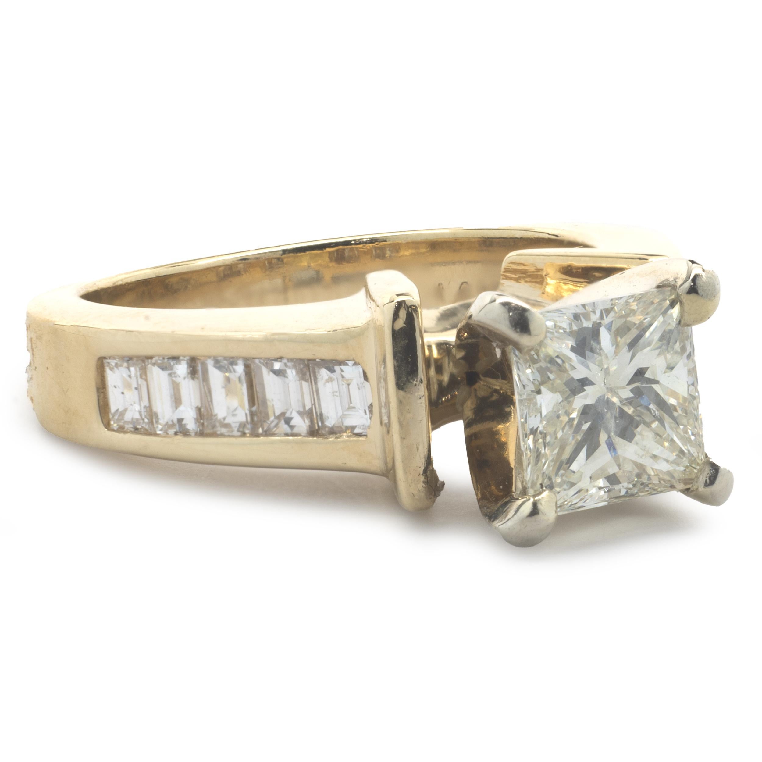Designer: custom
Material: 14K yellow gold
Diamond: 1 princess cut = .85ct
Color: J
Clarity: SI1
Diamond: 10 baguette cut = .20cttw
Color: G
Clarity: SI1-2
Ring Size: 4.5 (please allow up to 2 additional business days for sizing
