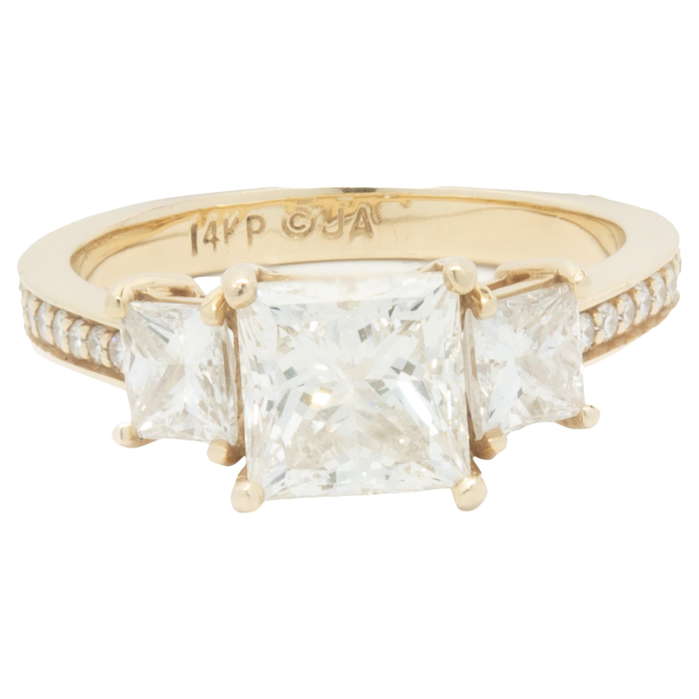 14 Karat Yellow Gold Princess Cut Diamond Three Stone Engagement Ring For Sale