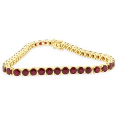 14 Karat Yellow Gold Prong Set Graduated Round Ruby Inline Bracelet 7.0" (bracelet en or jaune 14 carats)