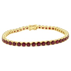 14 Karat Yellow Gold Prong Set Graduated Round Ruby Inline Bracelet 7.0" (bracelet en or jaune 14 carats)