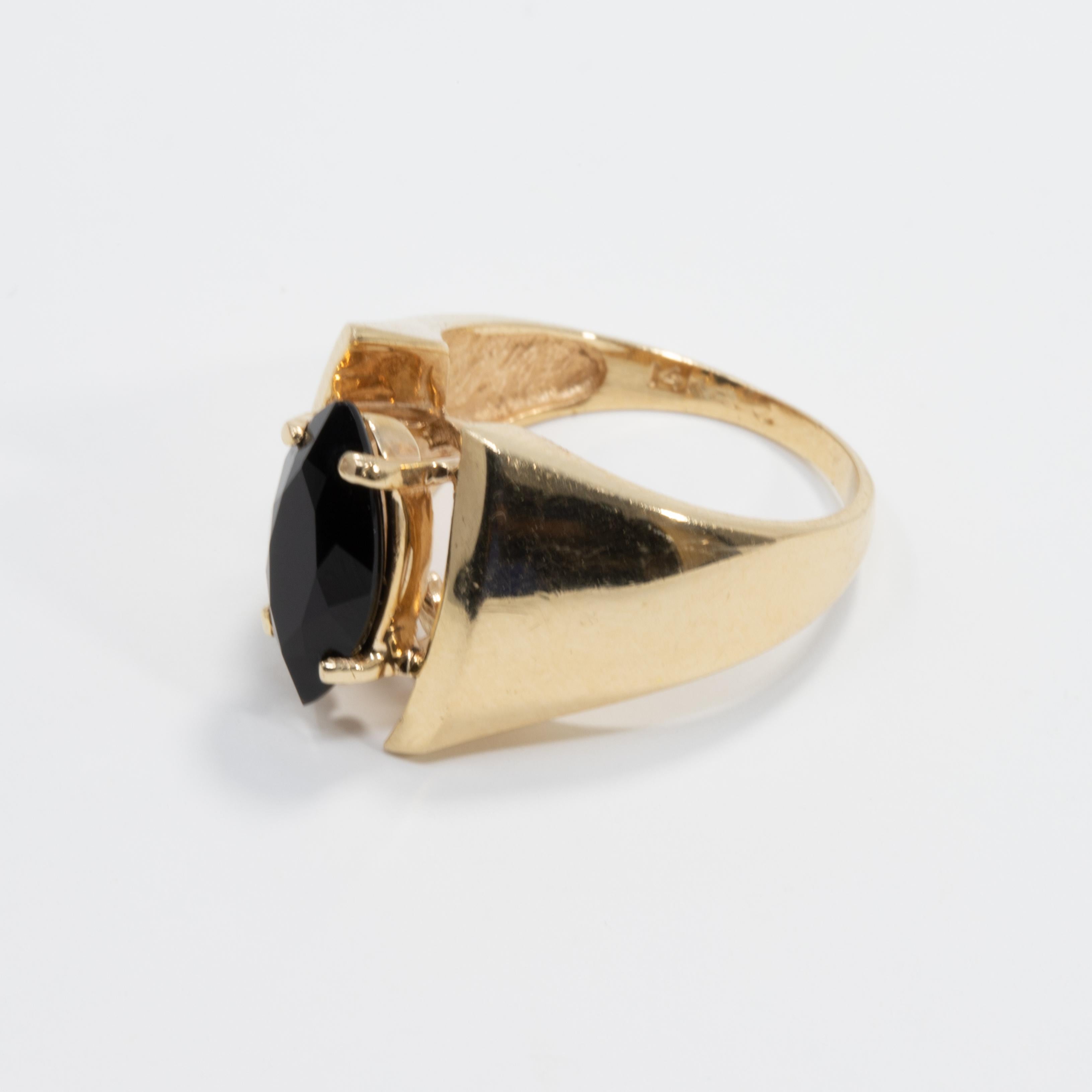 Marquise Cut 14 Karat Yellow Gold Prong Set Onyx Asymmetrical Cocktail Ring For Sale
