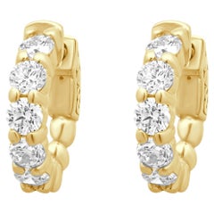 Boucles d'oreilles en or jaune 14 carats serties de diamants ronds