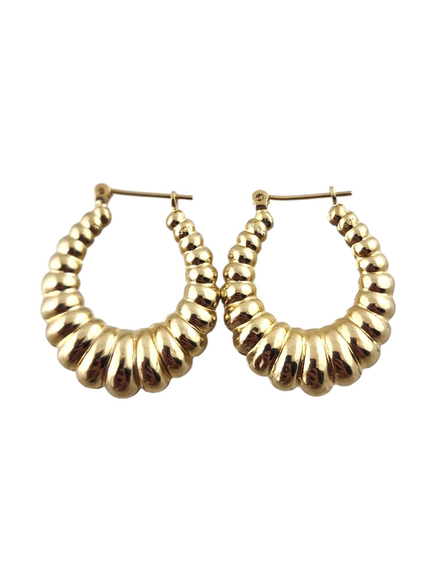 14 Karat Yellow Gold Puffy Oval Ribbed Hoop Earrings #18986 1