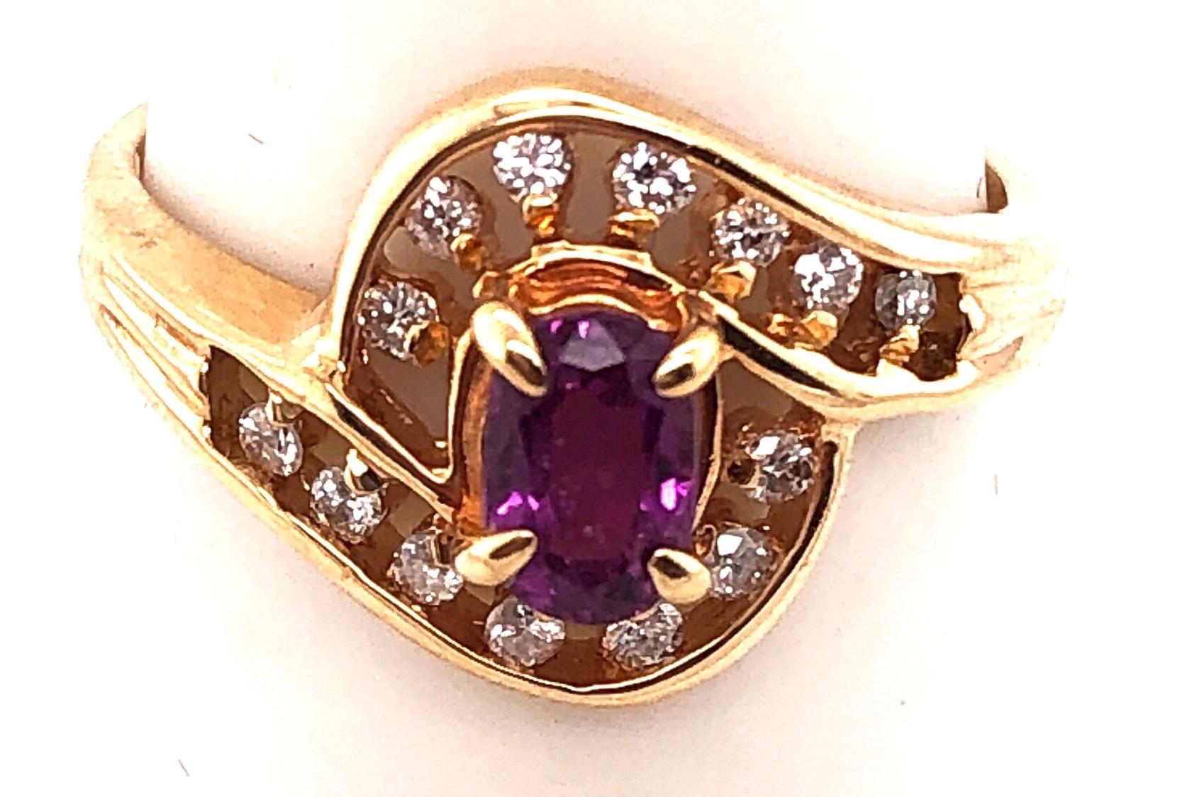 Oval Cut 14 Karat Yellow Gold Purple Peridot Ring with Round Diamond Accents 0.14 TDW For Sale