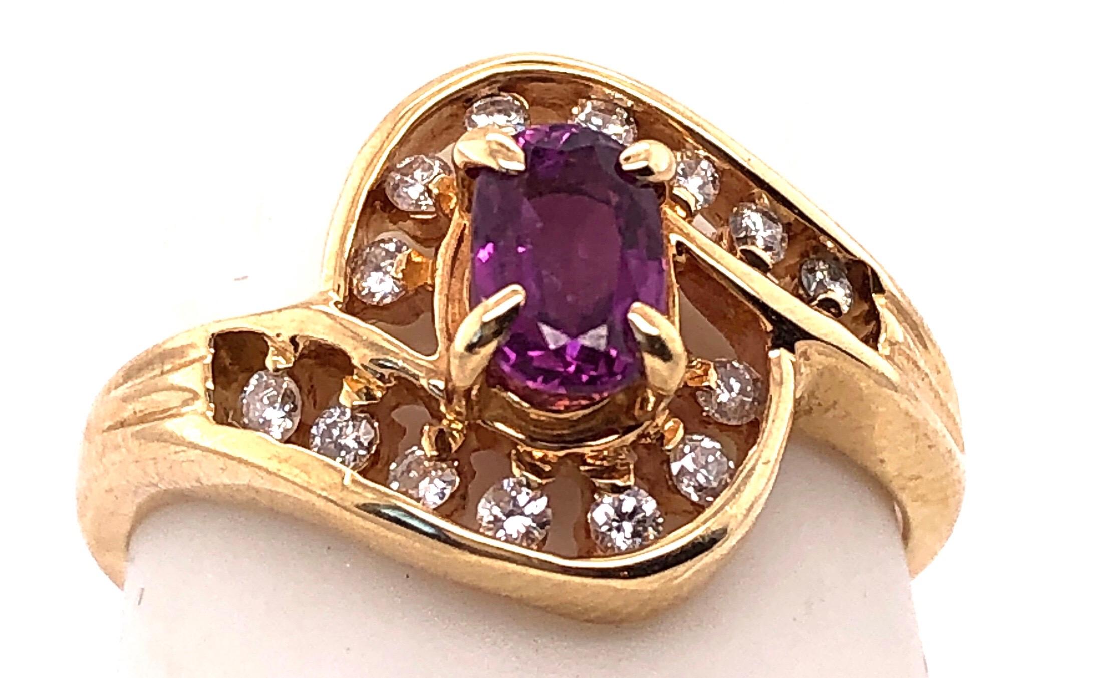 14 Karat Yellow Gold Purple Peridot Ring with Round Diamond Accents 0.14 TDW For Sale 1