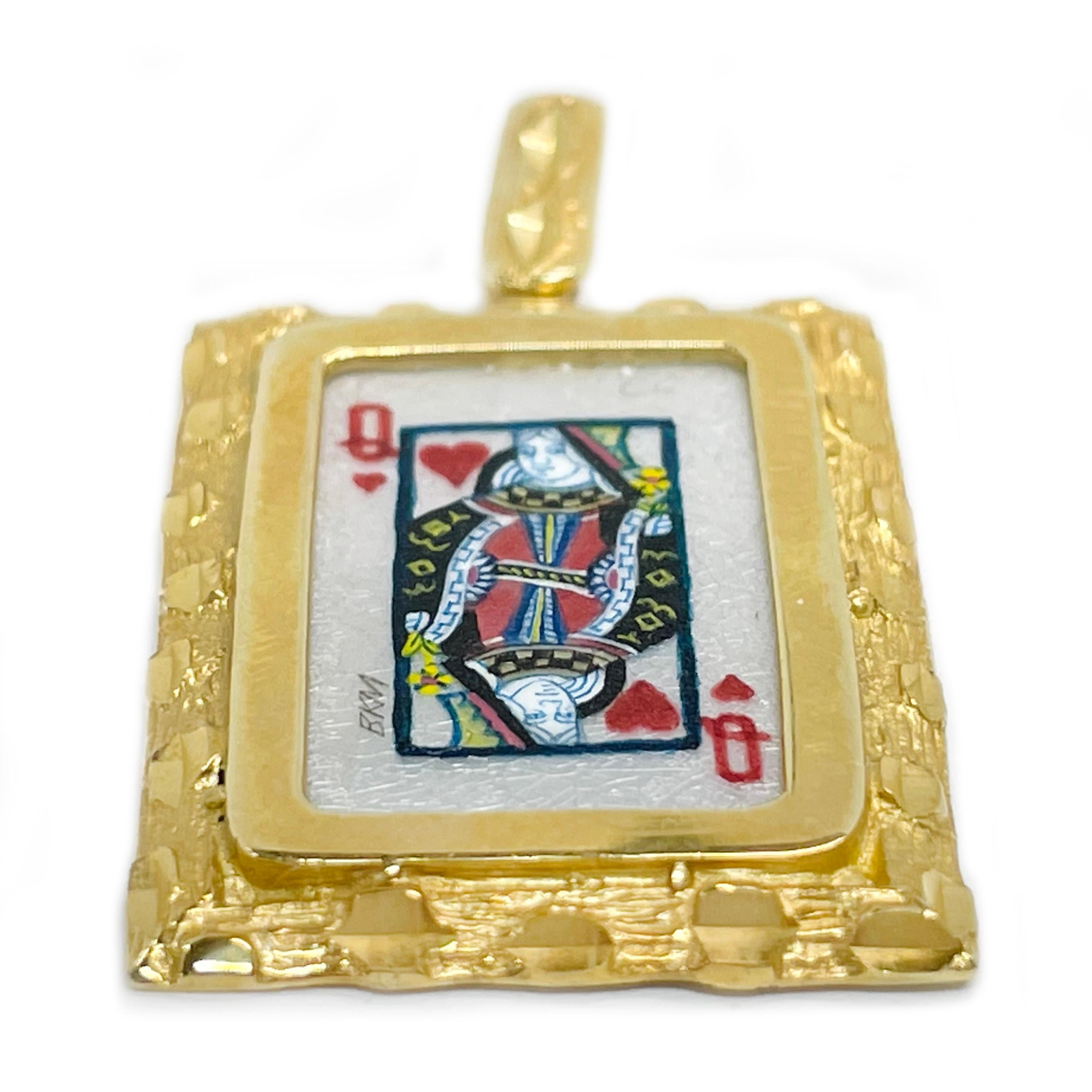 14 Karat Yellow Gold Hand Painted Queen of Hearts Playing Card on Mother of Pearl Pendant. The miniature painting is set in a 14 karat gold rectangular frame with diamond-cut details. The painting is signed by the master artist, BKM Brian M. and