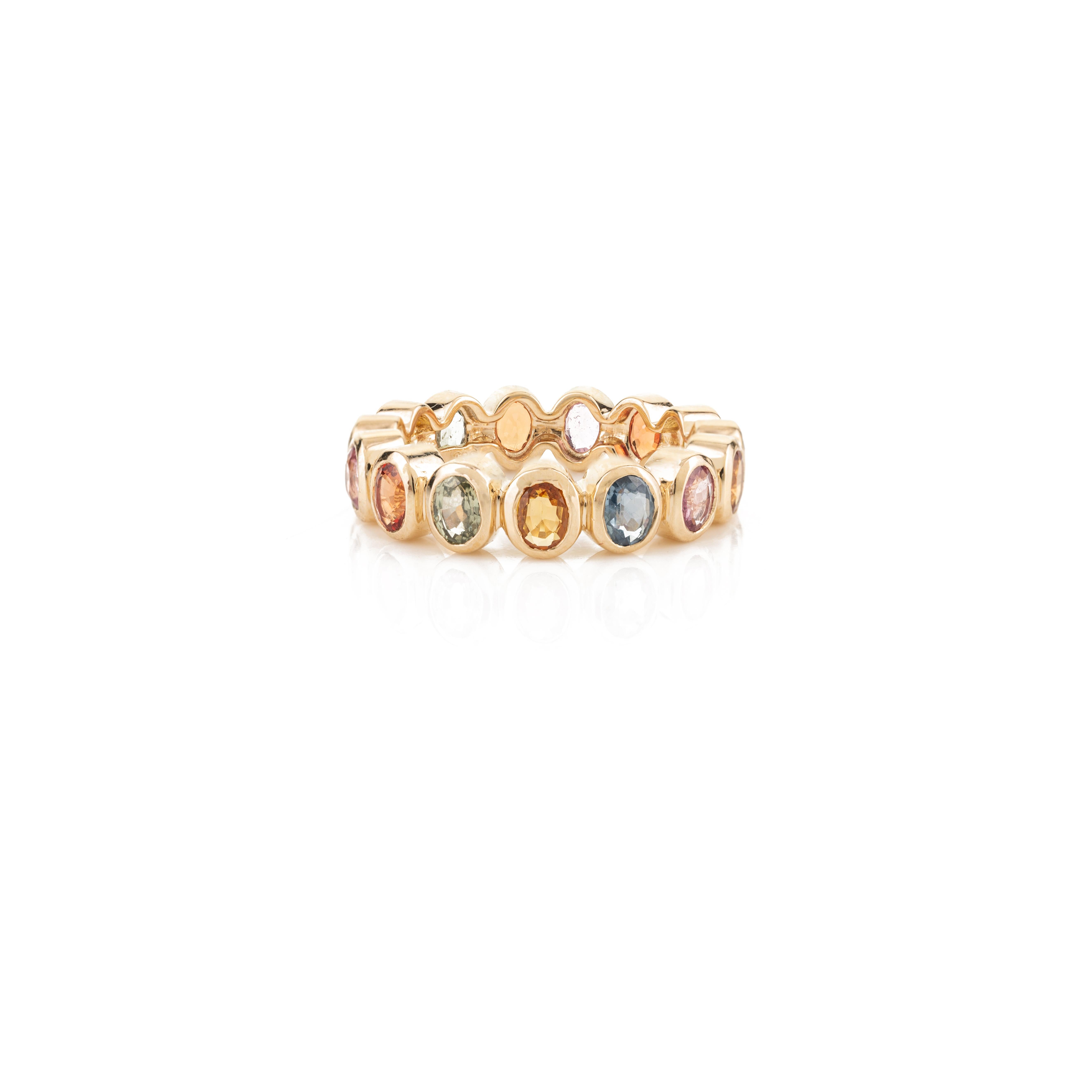 For Sale:  14 Karat Yellow Gold Rainbow Sapphire Bezel Set Eternity Band Ring for Her 3