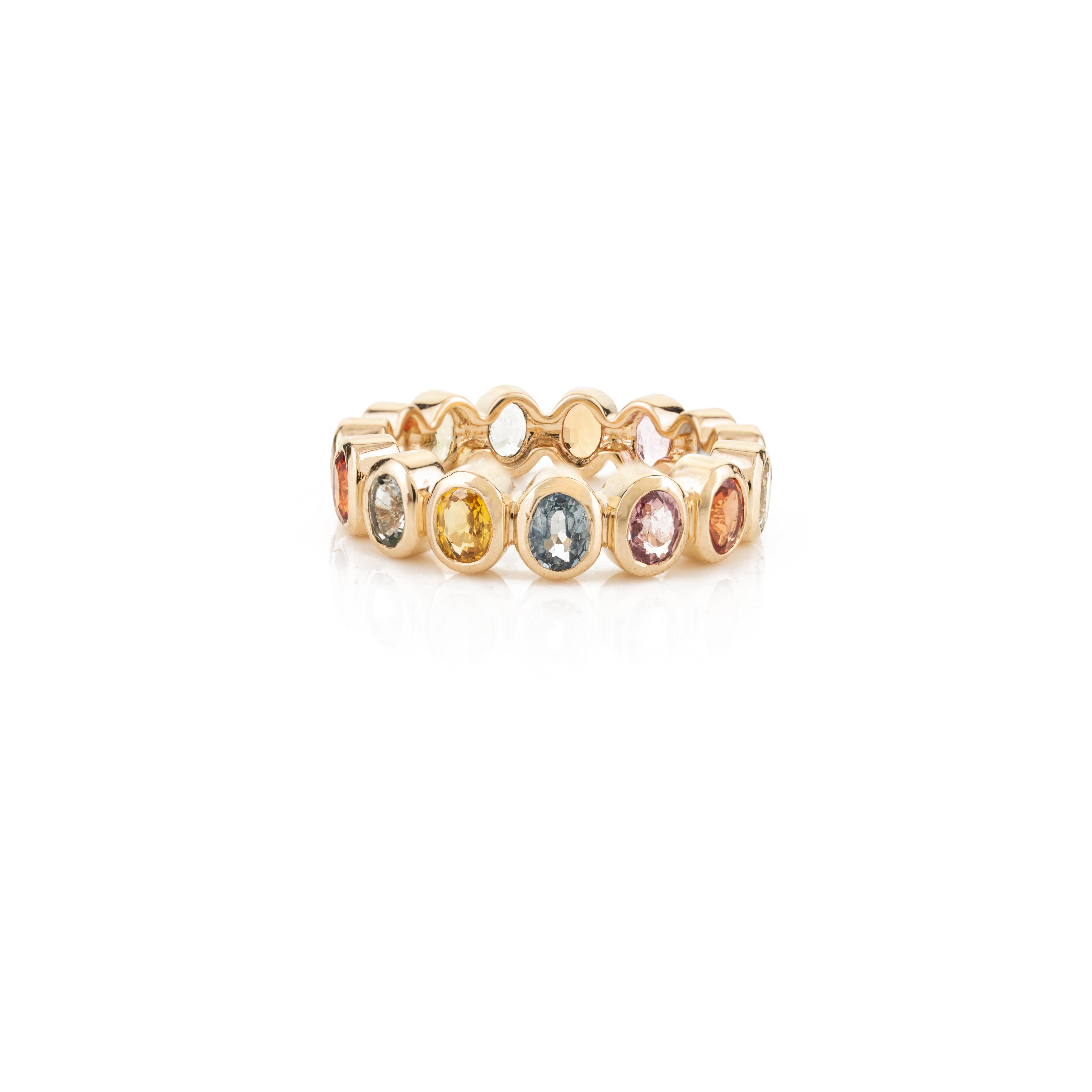For Sale:  14 Karat Yellow Gold Rainbow Sapphire Bezel Set Eternity Band Ring for Her 5