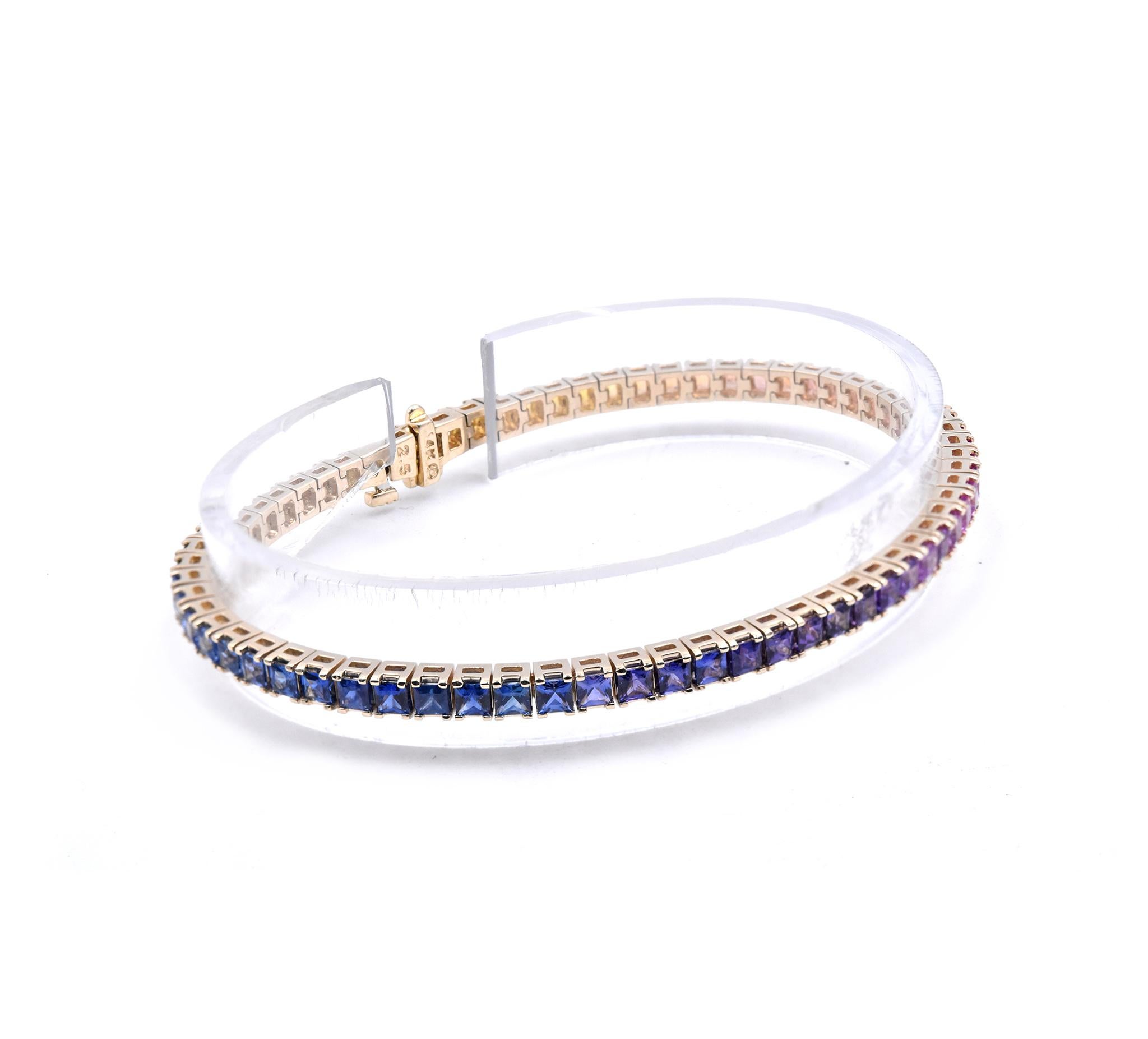 
Material: 14K yellow gold
Sapphire: 66 square cut = 6.48cttw
Color: Rainbow
Clarity: AAA+
Dimensions: bracelet will fit a 7-inch wrist
Weight: 12.23 grams
