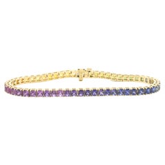 Bracelet tennis en or jaune 14 carats avec saphirs arc-en-ciel
