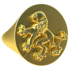 Bague sigillaire en or jaune 14 carats représentant un lion rampant