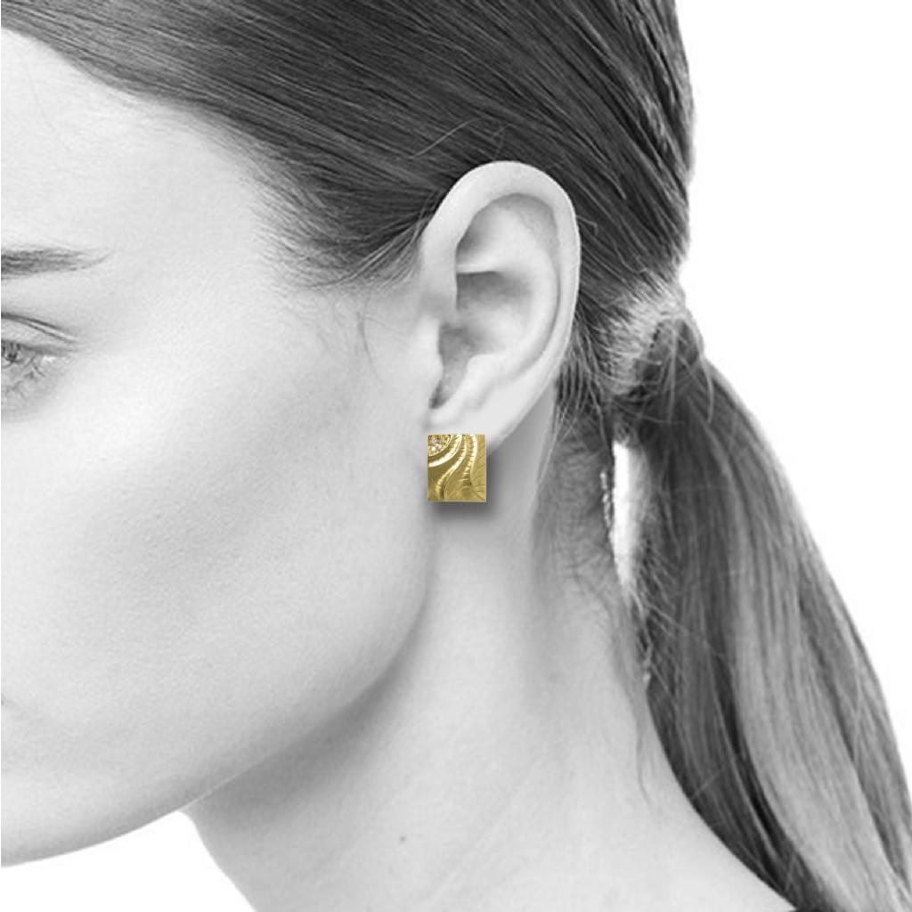 K.Mita's Rectangular Puzzle Earrings from her Sand Dune Collection are handmade by the artist from 14 Karat Yellow Gold and 0.18 Carats Diamonds (total weight). The pattern on the earrings, which are 14 mm x 12 mm, continues from left to right