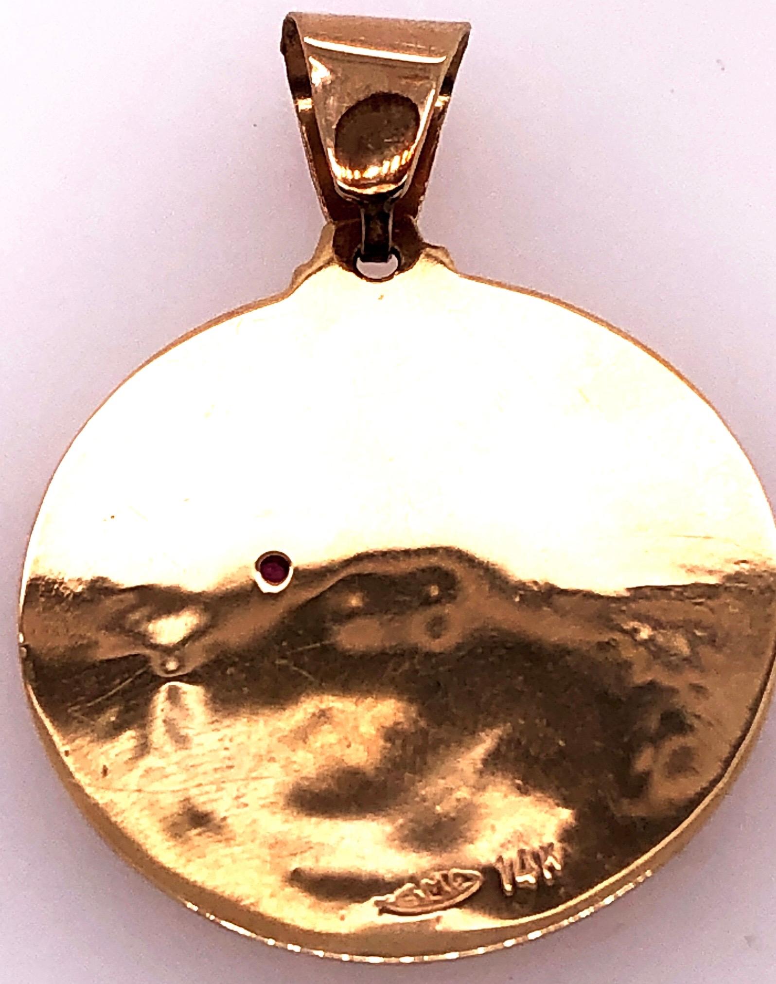 Round Cut 14 Karat Yellow Gold Religious Charm / Pendant with Ruby Accent
