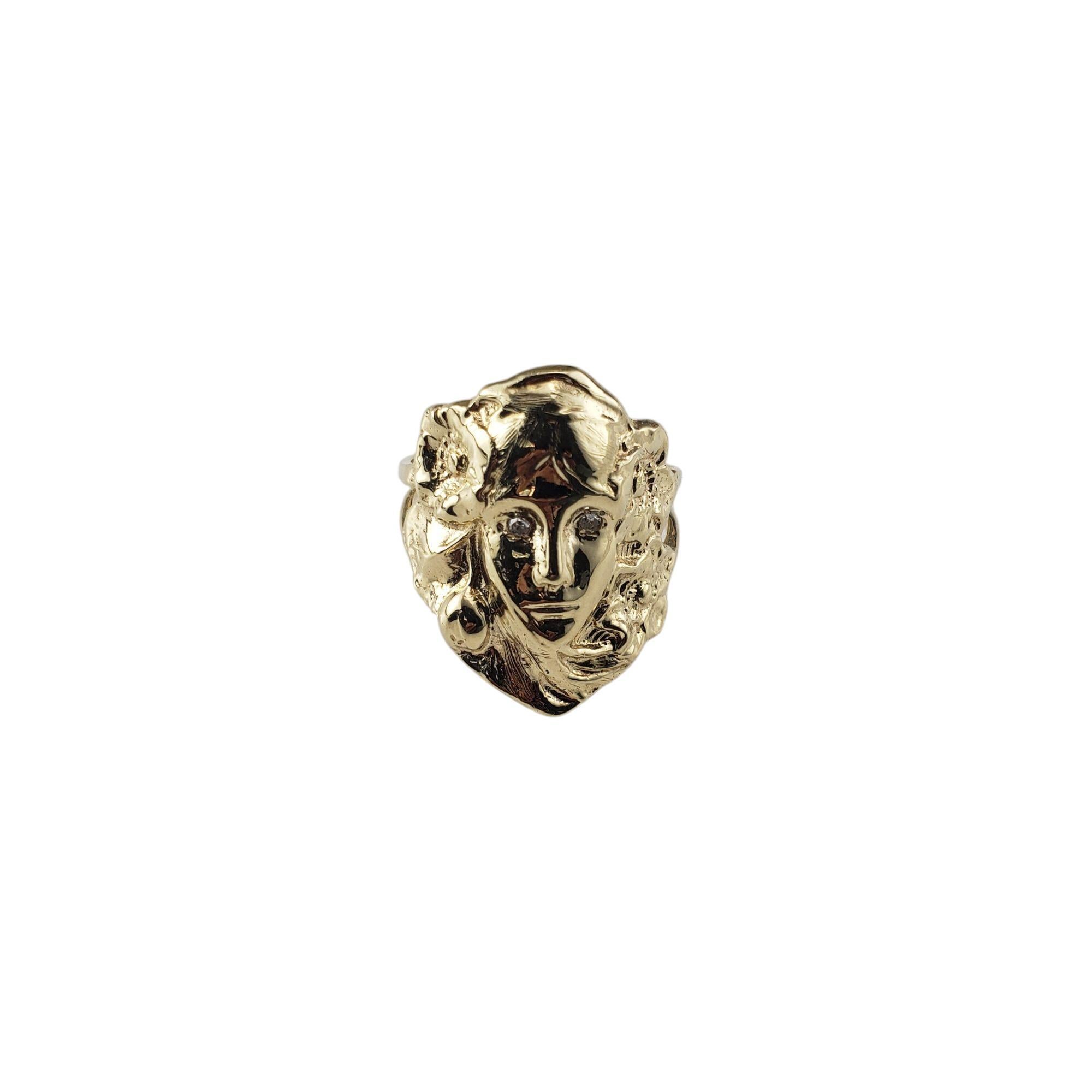 14K Yellow Gold Repousse and Diamond Woman Face Ring Size 7.75

This exquisite piece features a finely detailed female face surrounded by flowing hair and floral patterns. The repousse technique gives the ring an ethereal 3D quality. Accented with