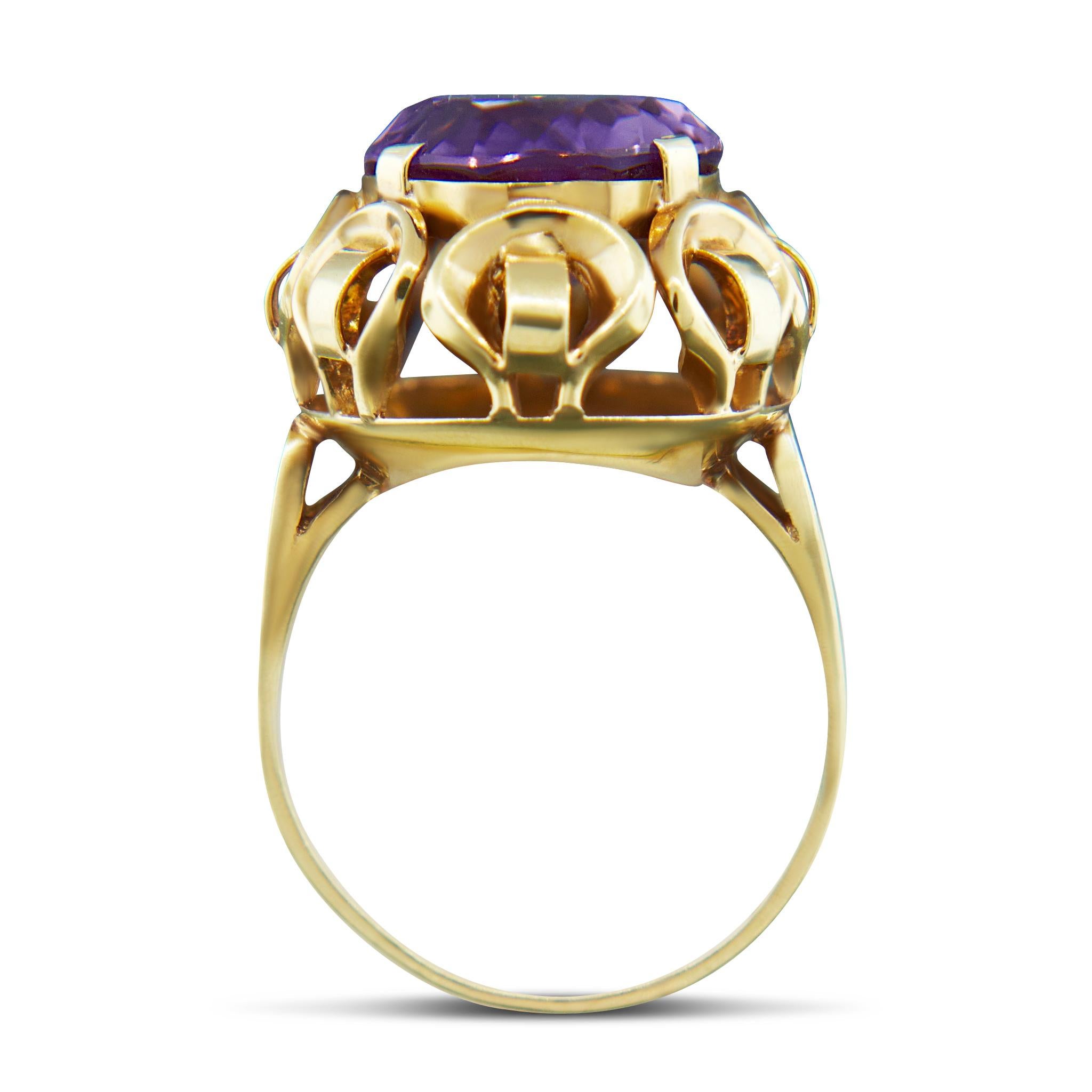 Original 1940s-1950s Amethyst ring, set in 14 carat yellow Gold, with fine intricate details around the stone. The Amethyst is an approx 8.5 carat making it an unusual statement dress ring.