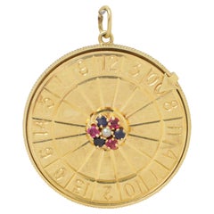 14 Karat Yellow Gold Vintage Spinning Roulette Wheel Charm