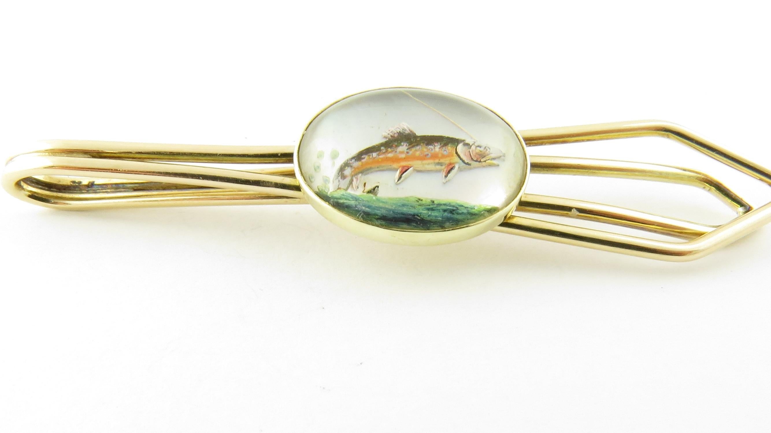 Vintage 14 Karat Yellow Gold Reverse Intaglio Fish Tie Clip

This lovely tie clip features a beautifully detailed reverse intaglio fish (16 mm x 13 mm) set on classic 14K yellow gold.

Size: 59 mm x 12 mm

Weight: 4.4 dwt. / 6.9 gr.

Stamped: