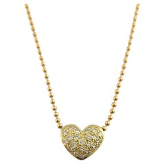 14 Karat Yellow Gold Reversible Diamond Heart Necklace