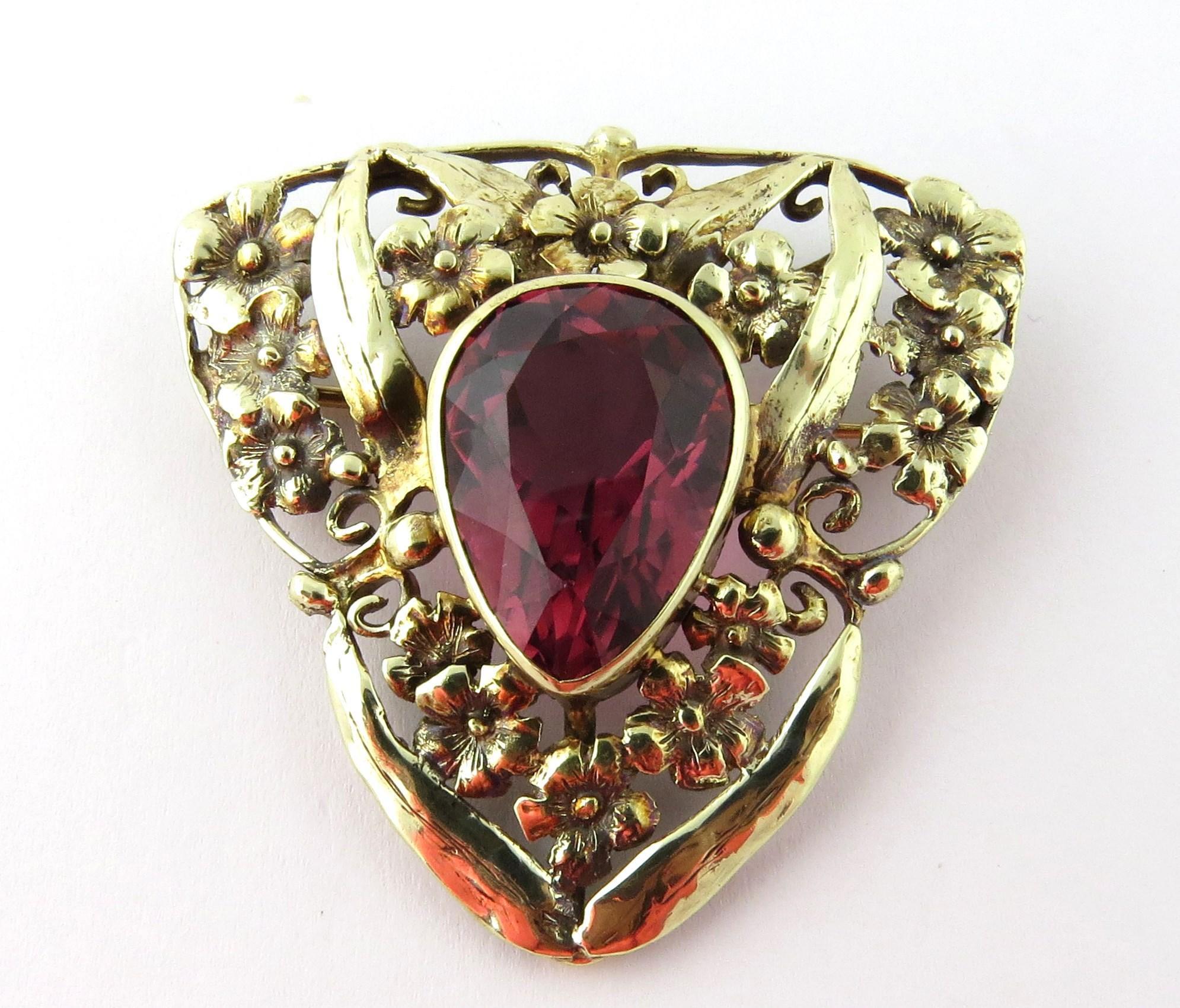 Vintage 14K Yellow Gold Rhodolite Floral Triangular Pin Brooch
44 mm in length, 46 mm at widest
Marquis rhodolite in setting is 21 mm by 16 mm at widest
11.6 dwt
18.1 g
Marked 14K 
Beautiful piece 
This will come shipped priority mail with