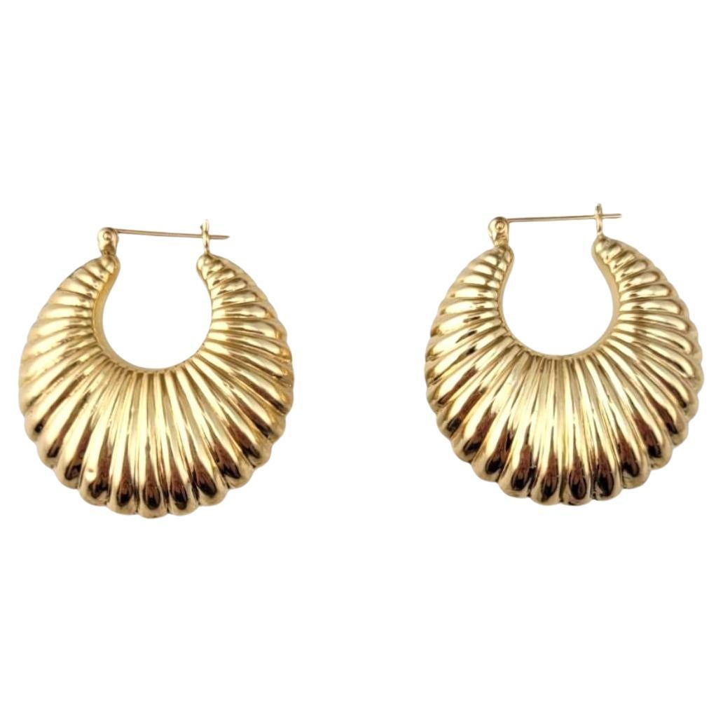 14 Karat Yellow Gold Ribbed Puffy Hoop Earrings #21880