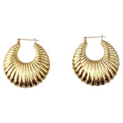 14 Karat Yellow Gold Ribbed Puffy Hoop Earrings #21880