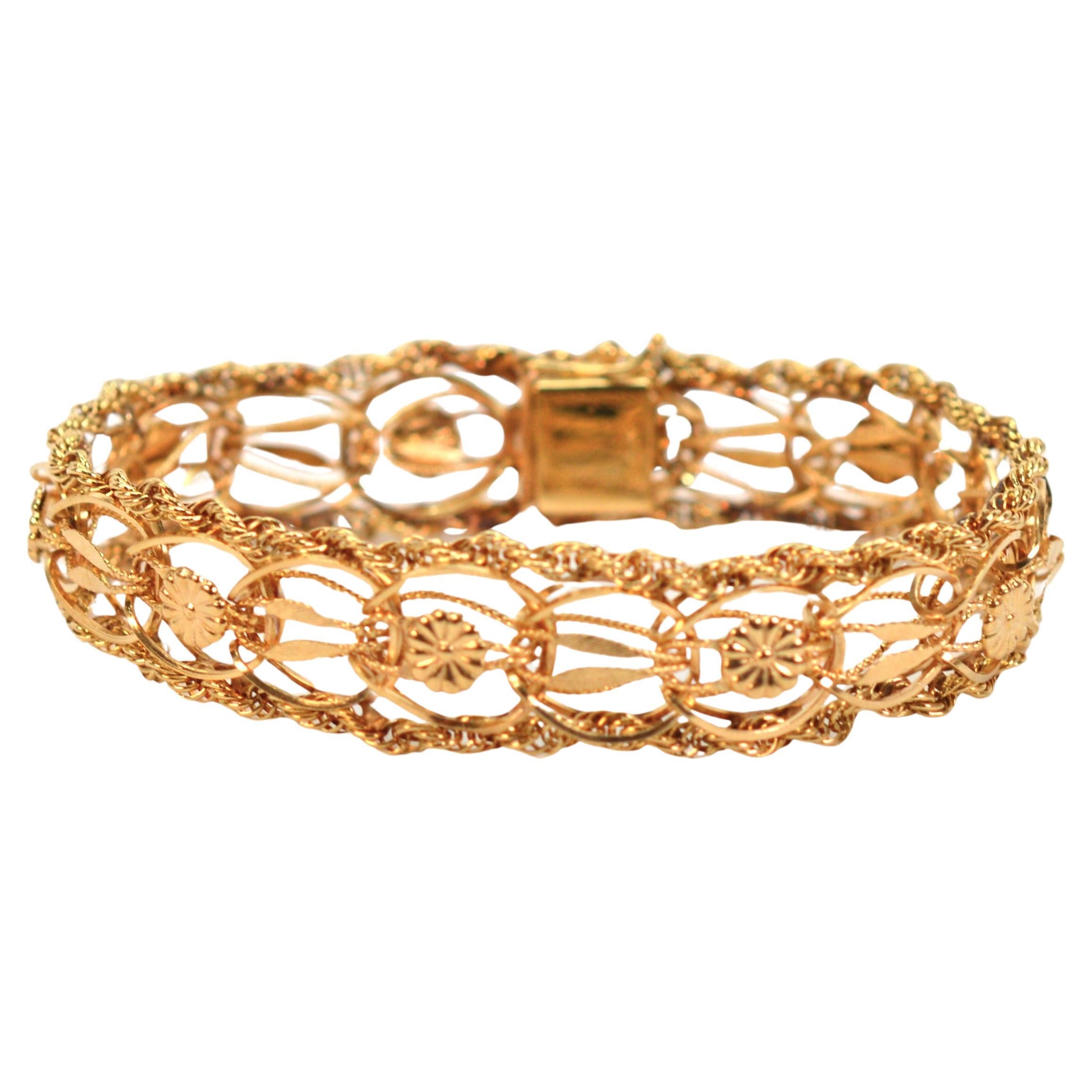 14 Karat Yellow Gold Ribbon Rope Bracelet w Floral Stations For Sale 1