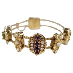 Amuleto de pulsera deslizante RGVS de Richard Glatter de oro amarillo de 14 quilates