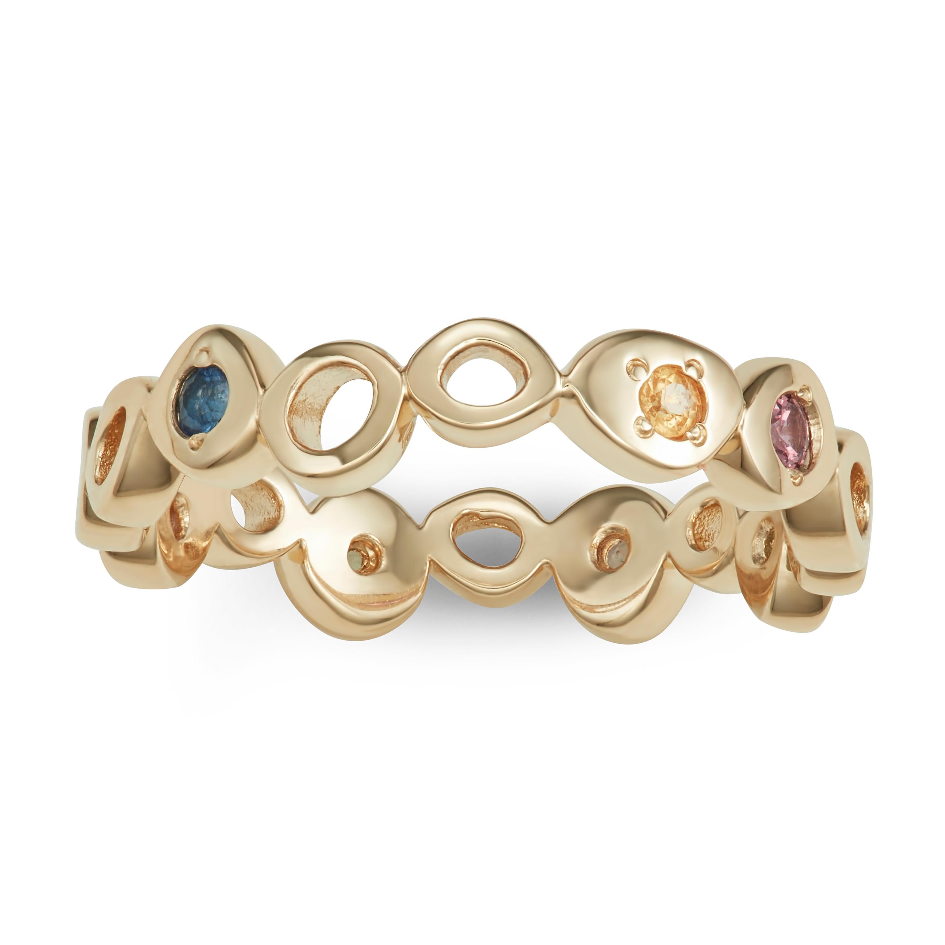 The perfect starter Hi June Parker ring has gotten a colorful makeover with
multi color sapphire stones sprinkled across the ring. Wear it alone or
stack with your favorite ring. 

Inspired by seeing the cross-section view of life, as if slicing a