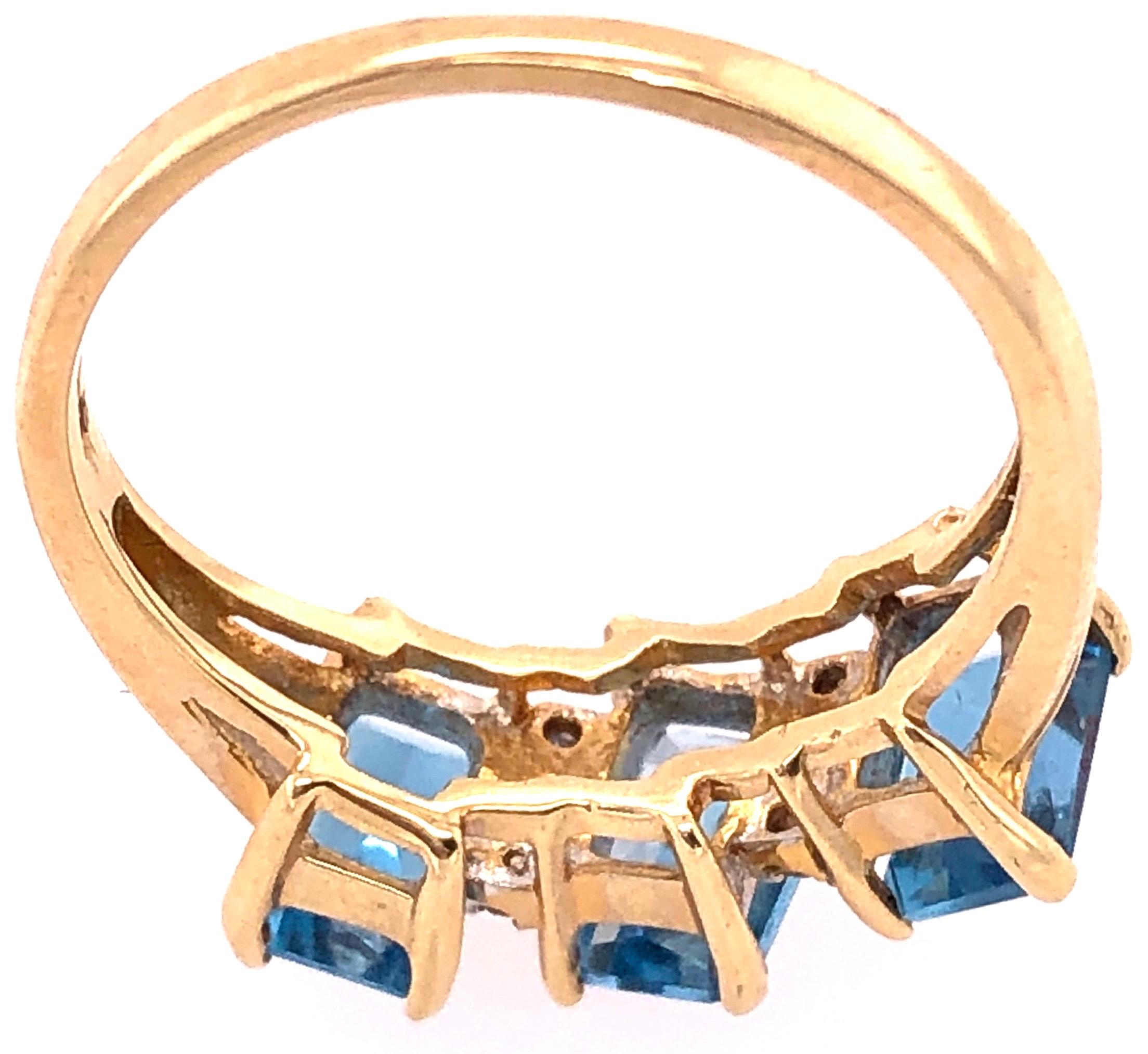 14 Karat Yellow Gold Ring Princess Cut Three Blue Topaz with Diamond Accents In Good Condition For Sale In Stamford, CT