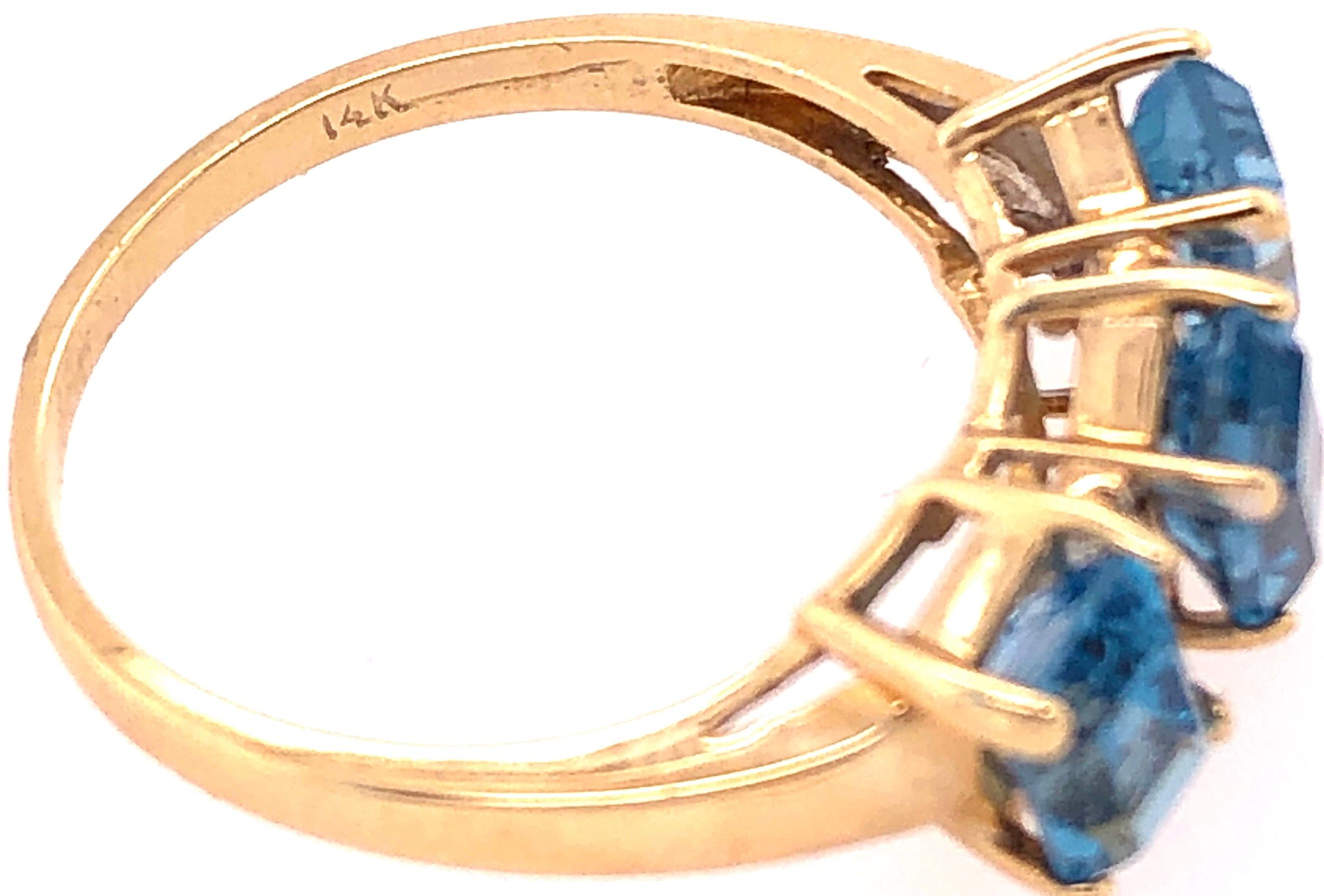 14 Karat Yellow Gold Ring Princess Cut Three Blue Topaz with Diamond Accents For Sale 1