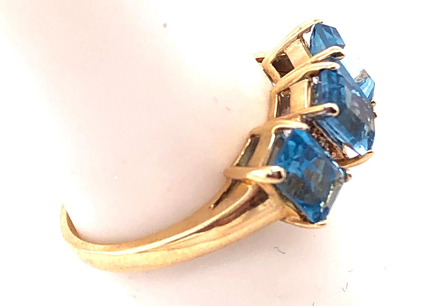 14 Karat Yellow Gold Ring Princess Cut Three Blue Topaz with Diamond Accents For Sale 2