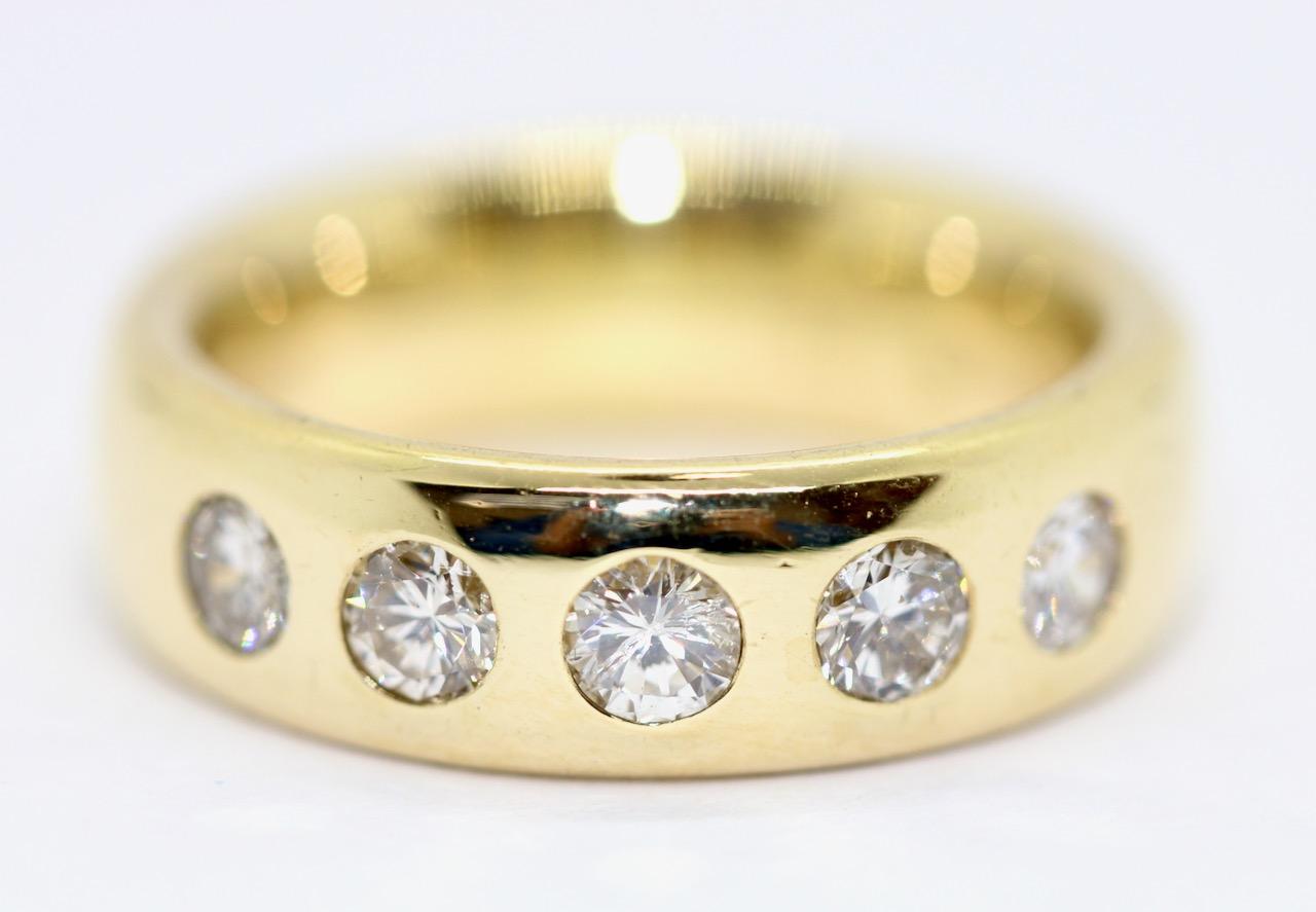 Modern 14 Karat Yellow Gold Ring Set with Five Solitaire Diamonds For Sale