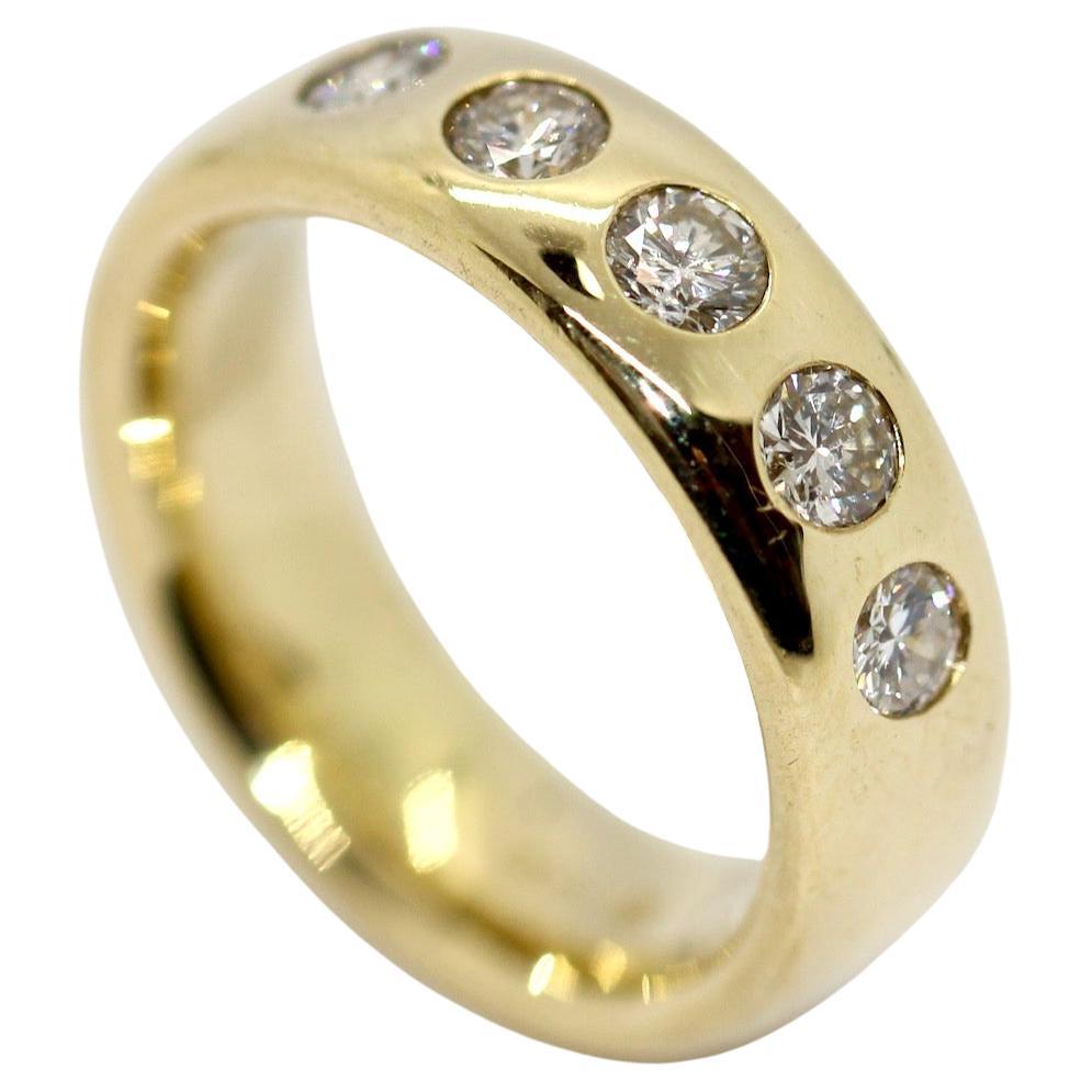 14 Karat Yellow Gold Ring Set with Five Solitaire Diamonds For Sale