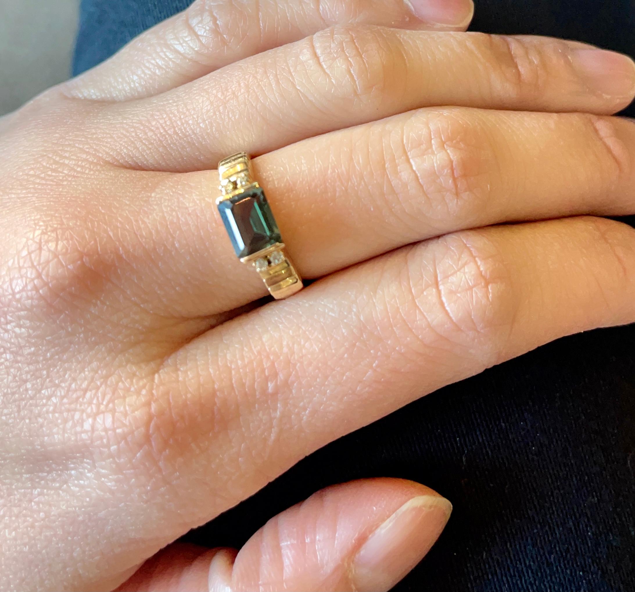 14 Karat Yellow Gold Ring with Center Emerald Cut Peridot and Diamonds 2