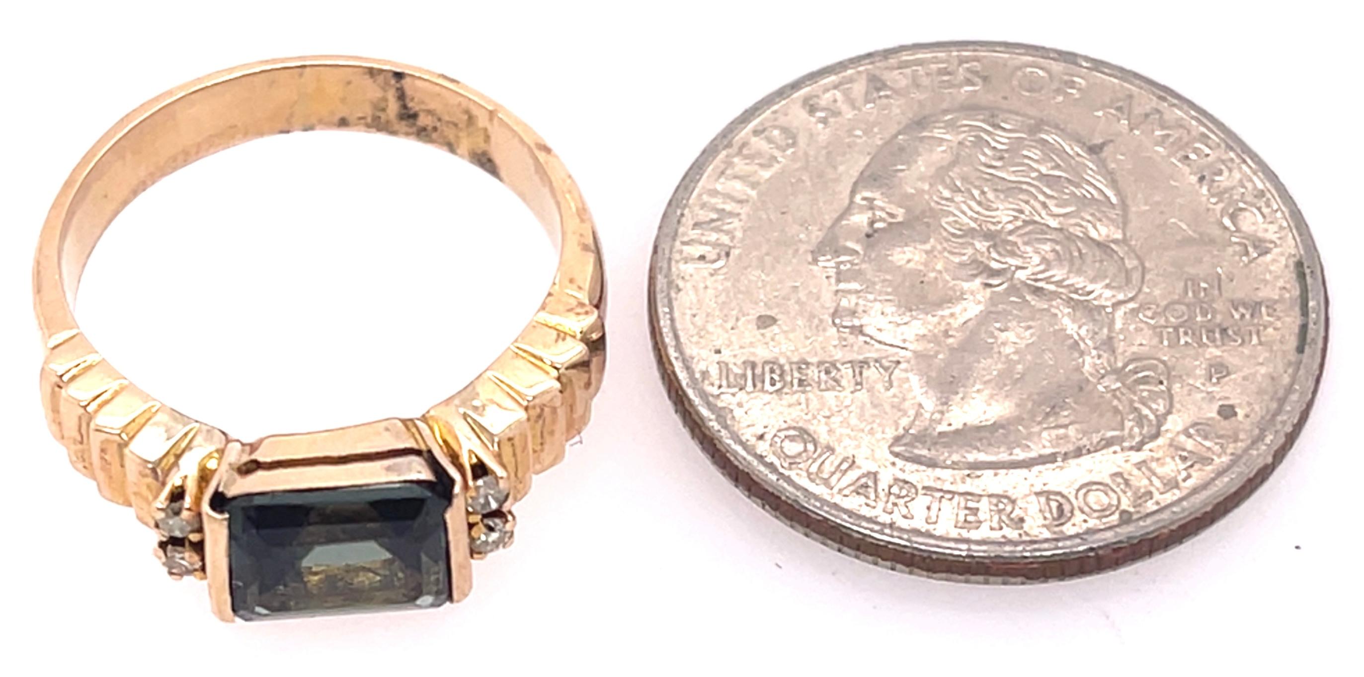 14 Karat Yellow Gold Ring with Center Emerald Cut Peridot and Diamonds 3