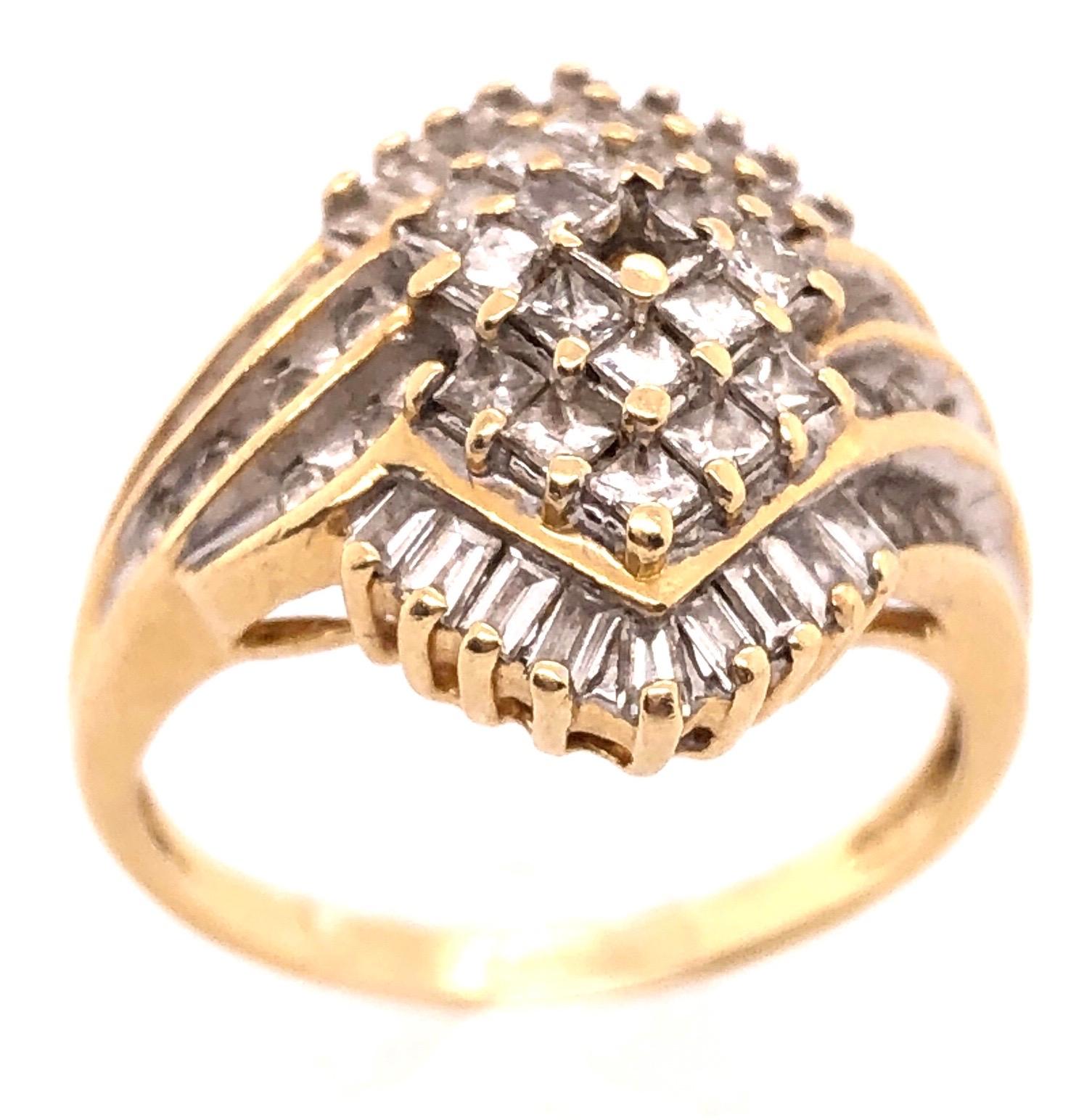 14 Karat Yellow Gold Ring With Diamond Cluster
Size 6.5
5.3 grams total weight.