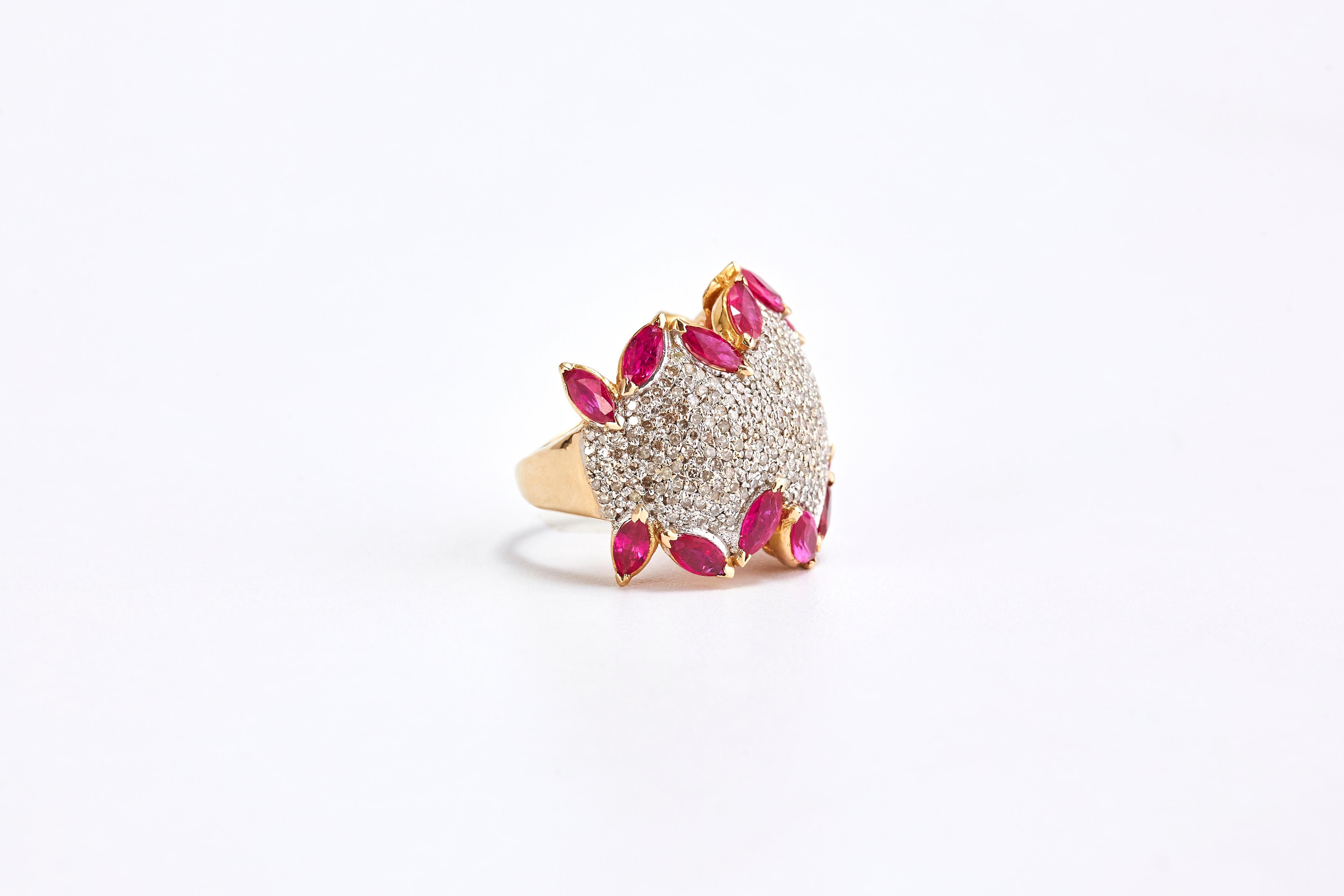 14 Karat Yellow Gold Ring with Diamonds and Rubies

Yellow gold ring with round cut diamonds and twelve marquise cut rubies around. Rich and stunning design.
8.15 ct of Rubies. 4.10 ct of Diamonds each one is approx. 0.1 ct.
Total weight: 14 grams.