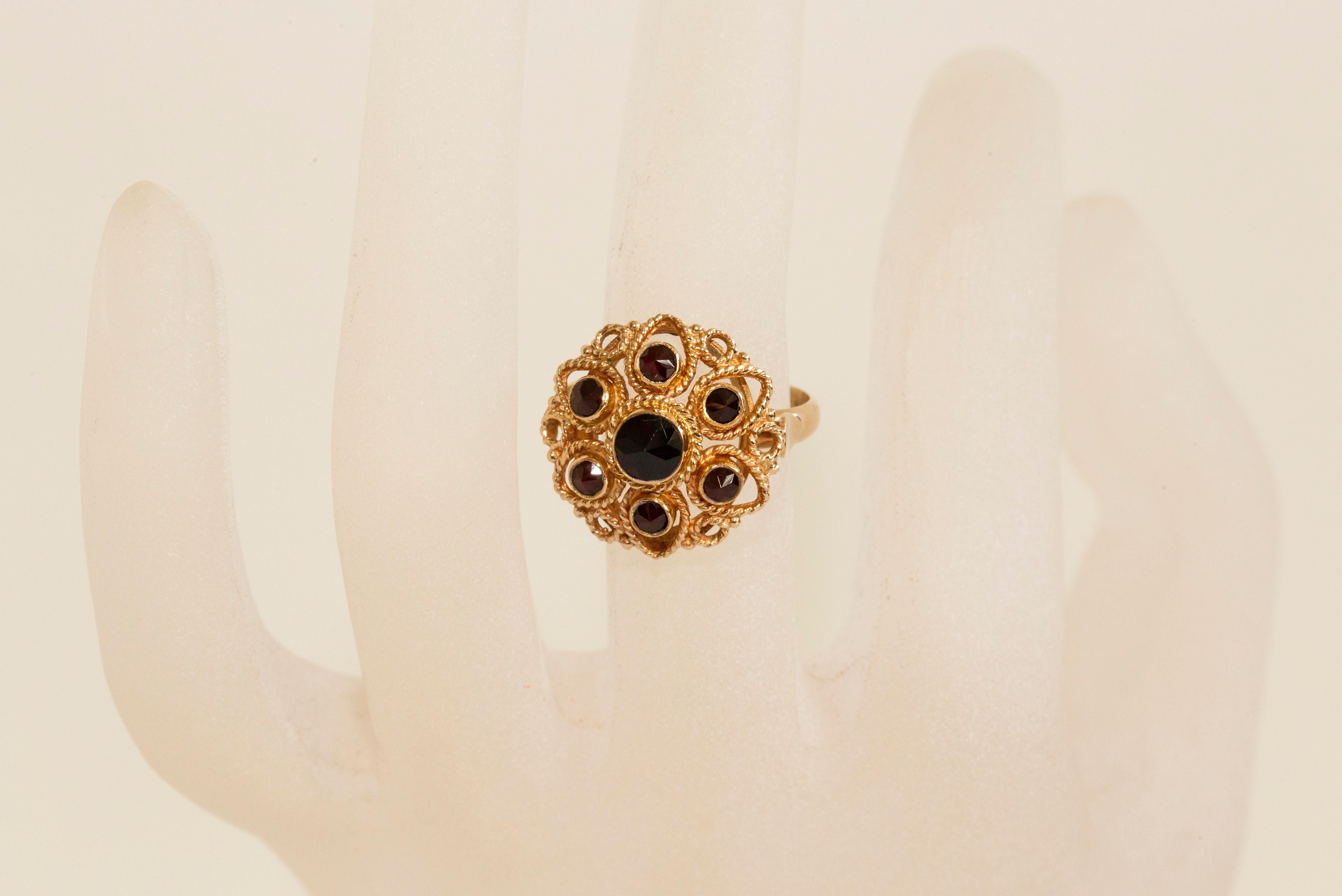 Etruscan Revival 14 Karat Yellow Gold Ring with Garnets in Filigree Flower Setting For Sale