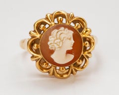14 Karat Yellow Gold Ring with Hand Carved Shell Cameo with Female Silhouette