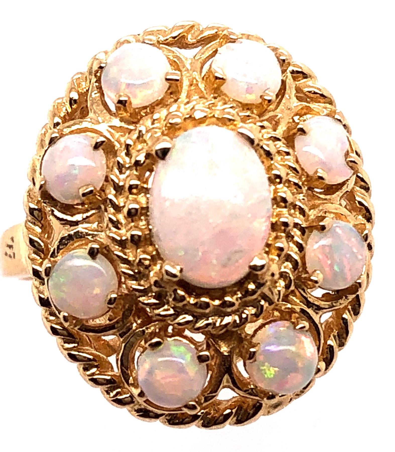 Modern 14 Karat Yellow Gold Ring with Opal Cluster For Sale