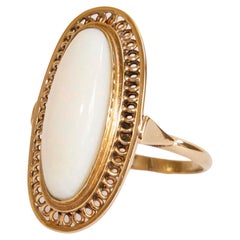 Vintage 14 Karat Yellow Gold Ring with Oval Cut Elongated Natural White Opal
